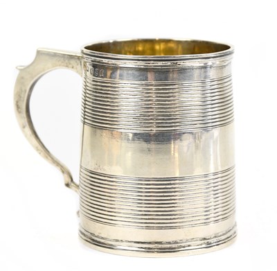 Lot 2236 - A George III hallmarked silver christening mug...