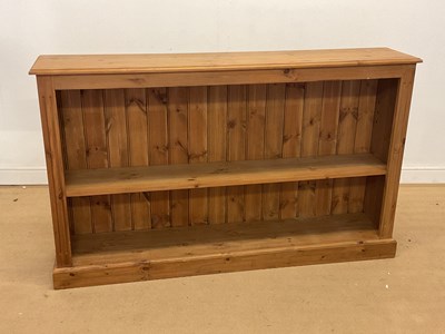 Lot 2843 - A modern low pine open bookcase with single...