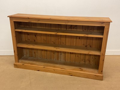 Lot 2841 - A pine open bookcase with two shelves, height...