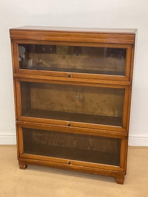 Lot 2790 - GLOBE WERNICKE; a mahogany three section...