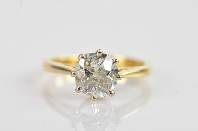 Lot 2246 - An 18ct yellow gold diamond solitaire dress...
