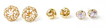 Lot 1113 - A pair of 9ct yellow gold knot stud earrings...