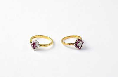 Lot 1030 - Two 18ct gold ruby and diamond cluster rings,...