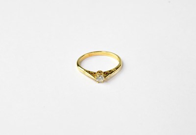 Lot 997 - An 18ct gold solitaire diamond ring, stamped...