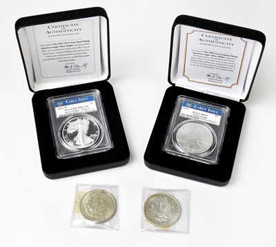 Lot 1014 - DANBURY MINT; two silver US dollars comprising...