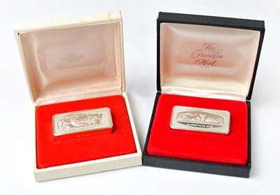 Lot 984 - FRANKLIN MINT; two ingots of solid sterling...