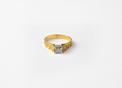 Lot 998 - An 18ct gold solitaire ring, illusion set with...