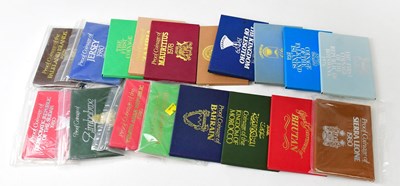 Lot 1009 - Thirty-two world annual coin sets comprising...
