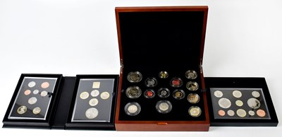 Lot 1005 - THE ROYAL MINT; three cased coin sets...