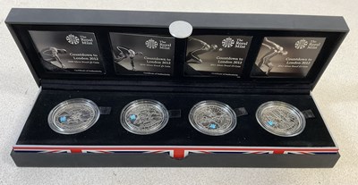 Lot 1158 - ROYAL MINT; a cased set of four encapsulated...