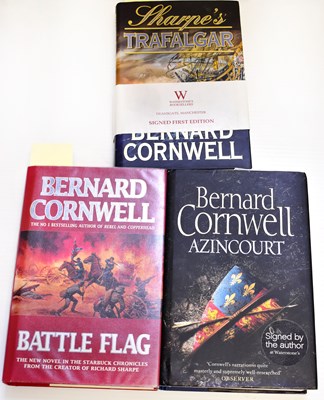 Lot 468 - BERNARD CORNWELL; three signed novels,...
