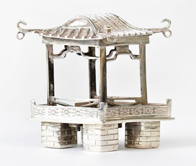 Lot 926 - A Chinese white metal model of a pagoda, with...
