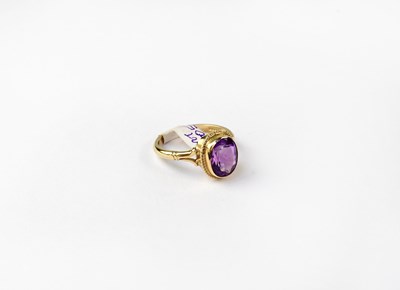 Lot 1052 - A 9ct gold ring set with amethyst, stamped 375,...
