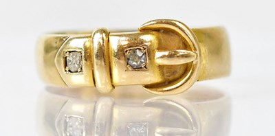 Lot 1077 - An 18ct yellow gold ring in the form of a belt,...