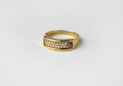Lot 1060 - A 9ct gold ring set with two rows of diamonds,...