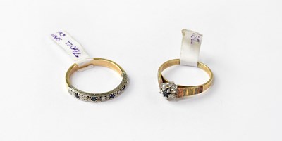 Lot 1091 - Two 9ct gold rings set with sapphires and...