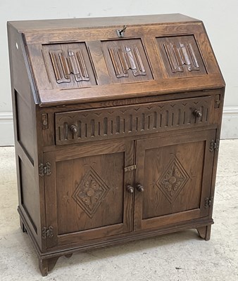 Lot 84 - A reproduction Priory style bureau, height...