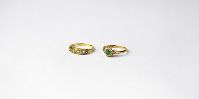 Lot 1093 - Two 9ct rings set with emeralds and diamonds,...