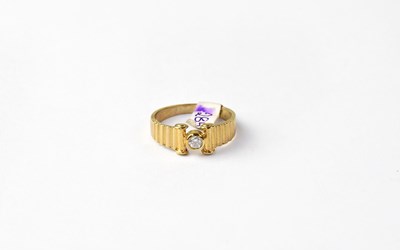 Lot 1040 - A 9ct gold solitaire diamond ring in...