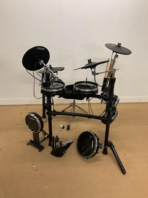 Lot 2383 - ALESIS; drum kit with stool, brain, pad and pedal