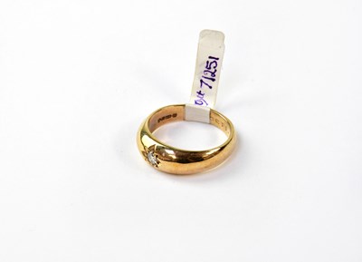 Lot 1038 - A 9ct gold solitaire diamond ring in star cut...