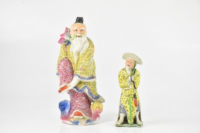 Lot 1615 - A Chinese Famille Rose figure of a gentleman...