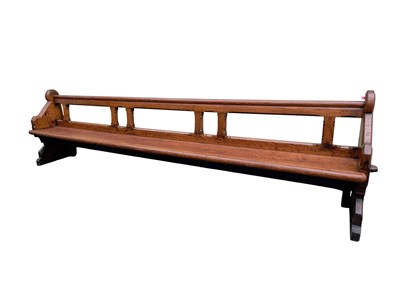 Lot 247 - A Victorian pitch pine pew, with folding knee...