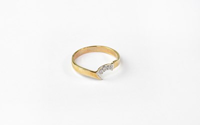Lot 1057 - A 9ct gold ring set with three diamonds in...