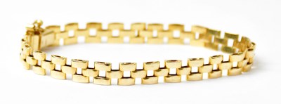 Lot 1081 - A 9ct yellow gold brick link bracelet, length...