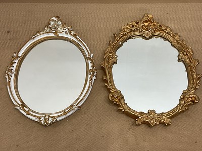 Lot 2851 - Two ornately decorated plaster mirrors, one...