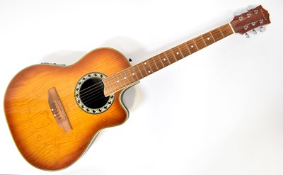 Lot 484 - WESLEY; a six-string semi-acoustic guitar,...