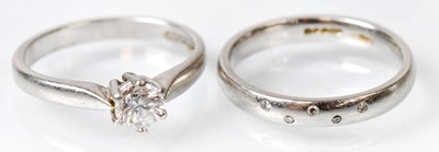 Lot 1078 - A platinum solitaire ring, the diamond approx....