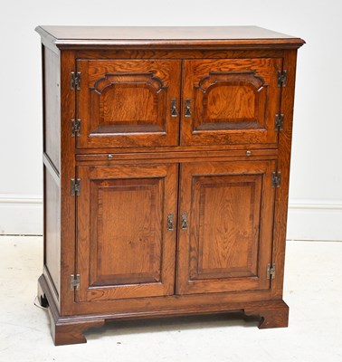 Lot 62 - A reproduction Titchmarsh & Goodwin type oak...