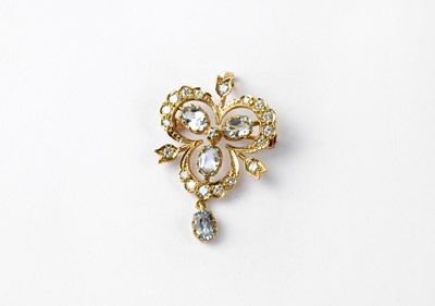 Lot 1131 - A 9ct gold topaz and diamond set...