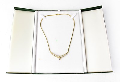 Lot 1160 - A 9ct gold chain necklace set with seven...