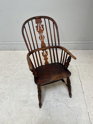 Lot 206 - An early19th century ash and elm Windsor arm...