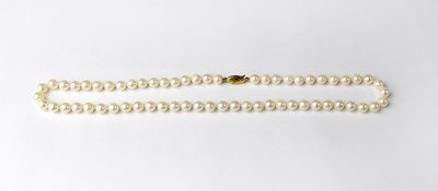 Lot 1185 - A pearl necklace with 9ct gold clasp stamped...