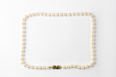 Lot 1186 - A pearl necklace with 9ct gold clasp, stamped...