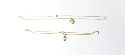 Lot 1171 - Two 9ct gold pendant necklaces, comprising a...