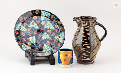 Lot 574 - RUSSELL KINGSTON; a slipware jug, height 19cm,...