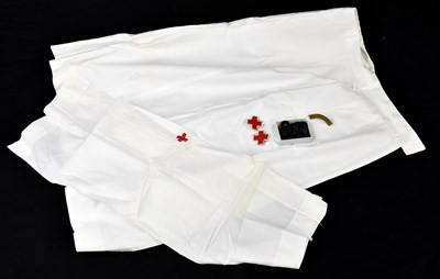 Lot 1084 - A Red Cross uniform, together with Red Cross...