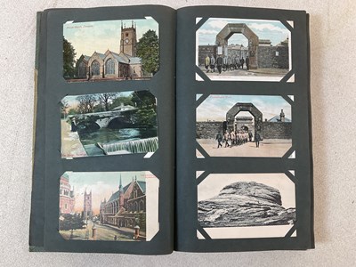 Lot 2127 - A postcard album comprising approximately...