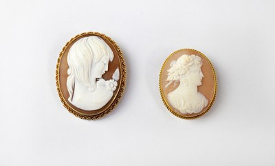 Lot 1139 - Two 9ct gold cameo brooches, one carved with a...