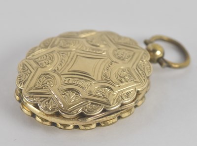 Lot 1272 - A 19th century yellow metal floral engraved...