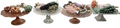Lot 606 - Four pressed and moulded glass comports and a...