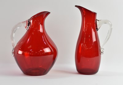 Lot 629 - WHITEFRIARS; two 1950s ruby red art glass jugs...