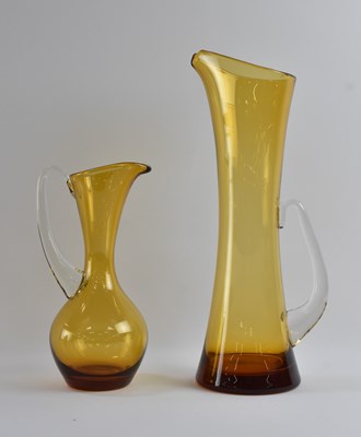 Lot 634 - WHITEFRIARS; two 1960s/1970s amber glass jugs,...
