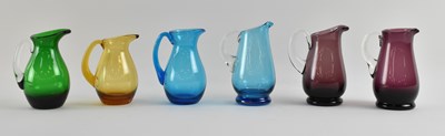 Lot 625 - WHITEFRIARS; six mid century art glass jugs of...