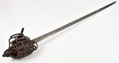 Lot 664 - A basket hilt broad sword, with shagreen grip,...