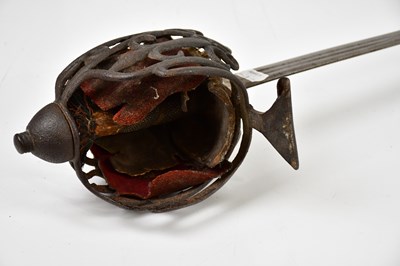 Lot 664 - A basket hilt broad sword, with shagreen grip,...